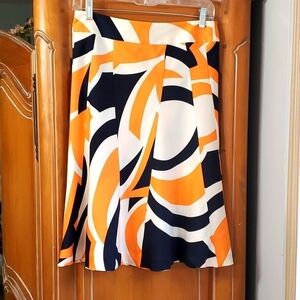FABRIQUE, 96% silk 4% spandex skirt. Orange and black.‎ Skaters. Size sma…